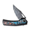 WEKNIFE Nefaris Button Lock Knife Black Titanium Handle With Nebula Fat Carbon Fiber Inlay (3.48" Heimskringla Damasteel Blade) WE22040F-DS1